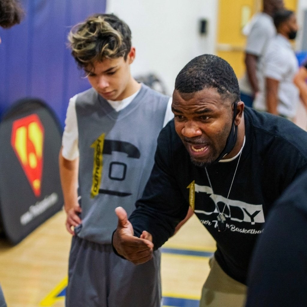 Intense coaching moment courtside